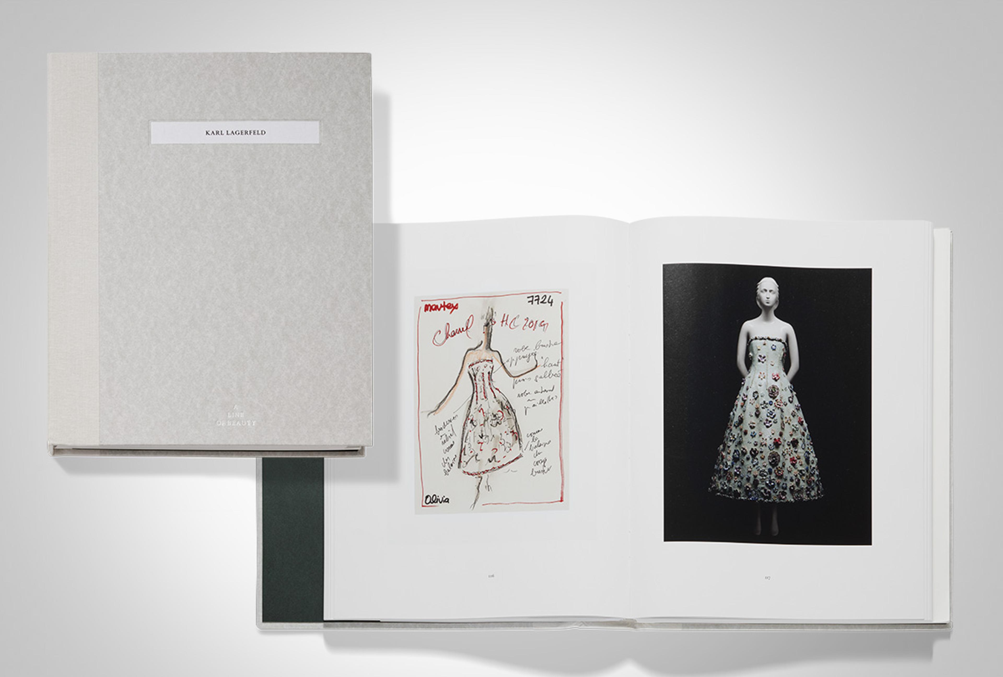 Two catalogues, one open and one closed, for "Karl Lagerfeld: A Line of Beauty." The open catalogue features a sketch and a garment photo side by side.