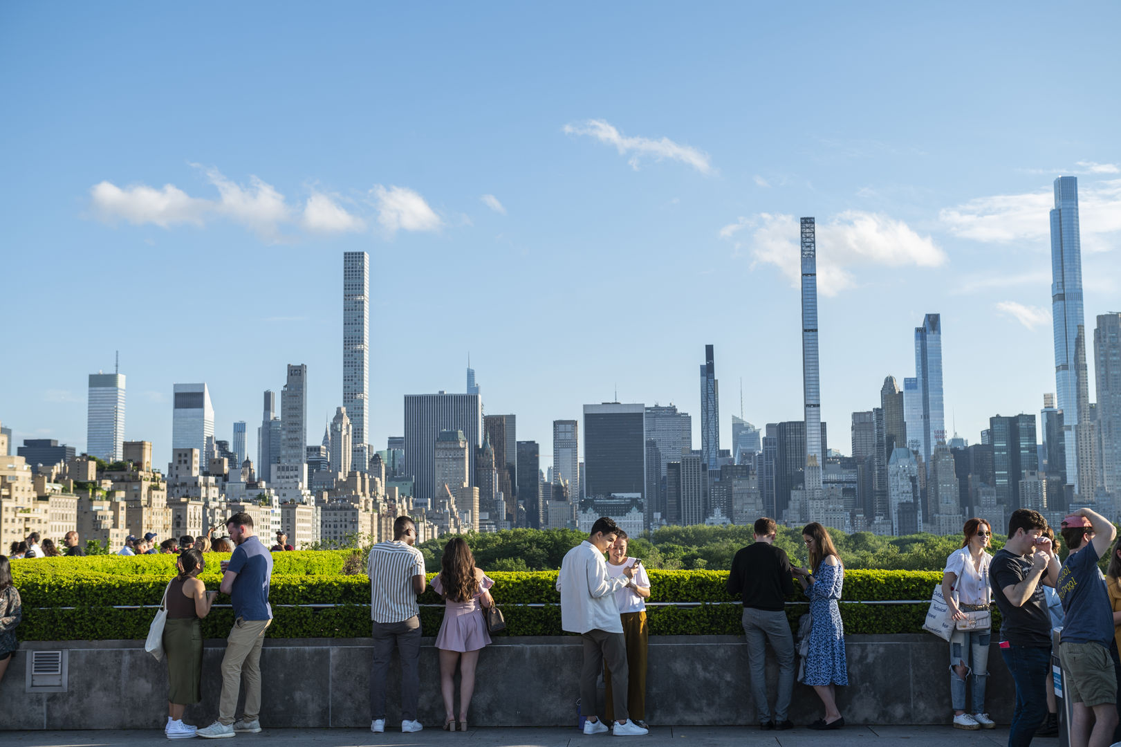Visitors on the roof of the Metropolitan Museum of Art viewing the New York City skylines